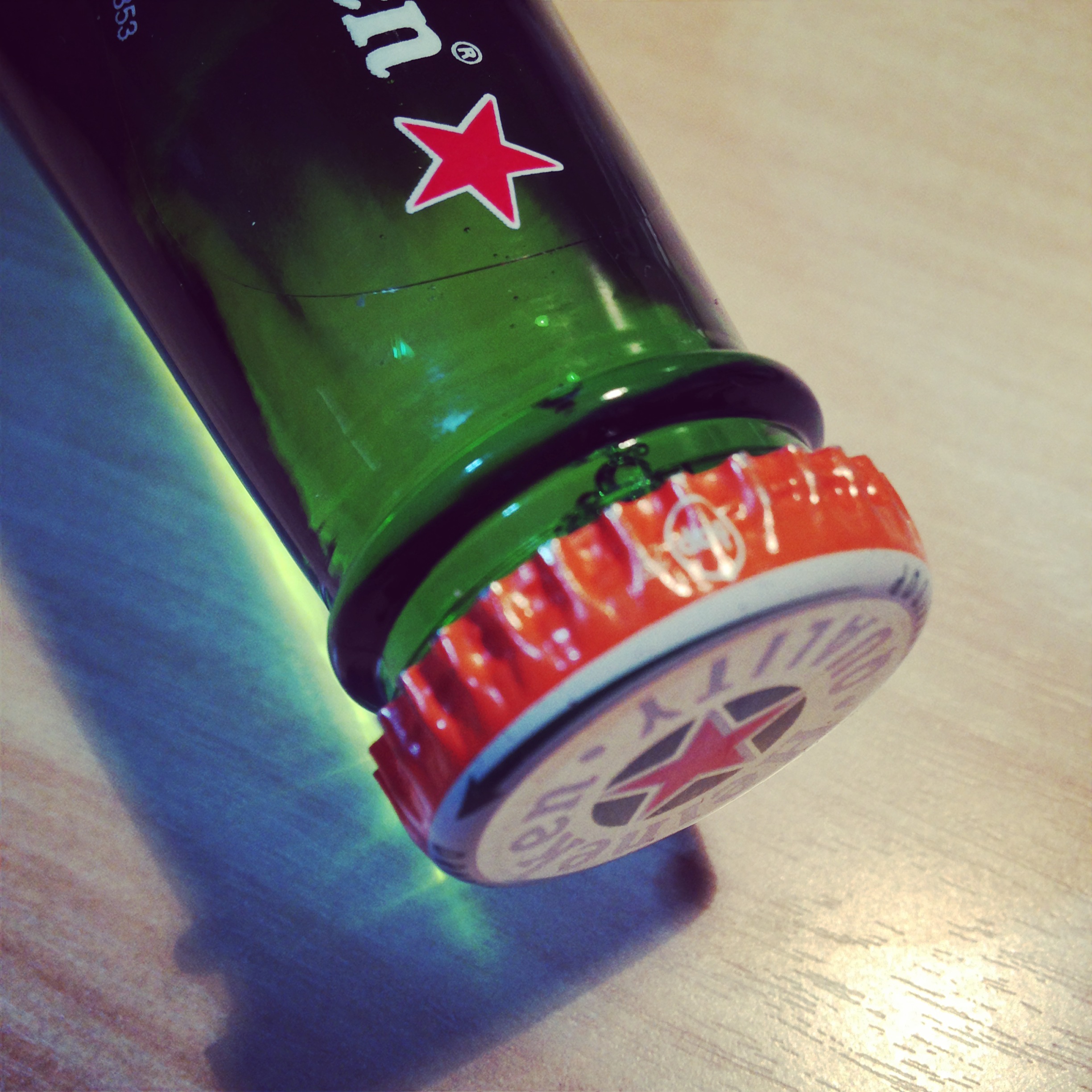 📷 Heineken with orange bottle cap